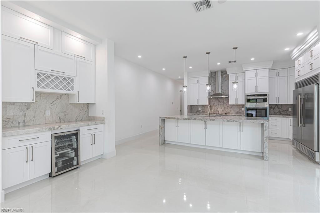 3098 Pine Tree Dr , Naples, FL 34112 Photo