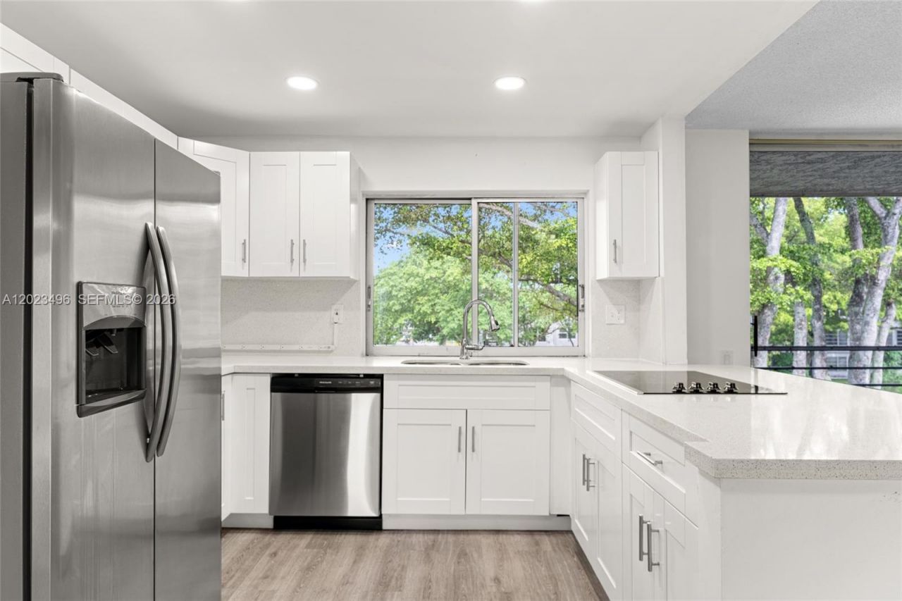 9091 Lime Bay Blvd , Unit 304, Tamarac, FL 33321 Photo