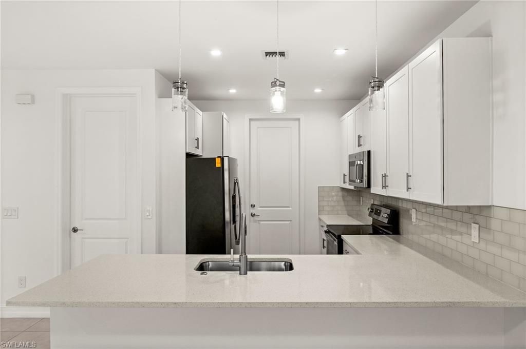 7643 Morgan Way, Naples, FL 34119 Photo