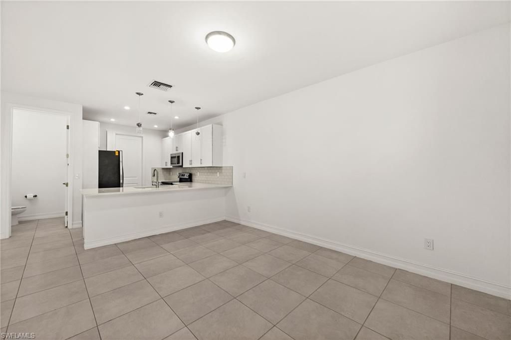 7643 Morgan Way, Naples, FL 34119 Photo