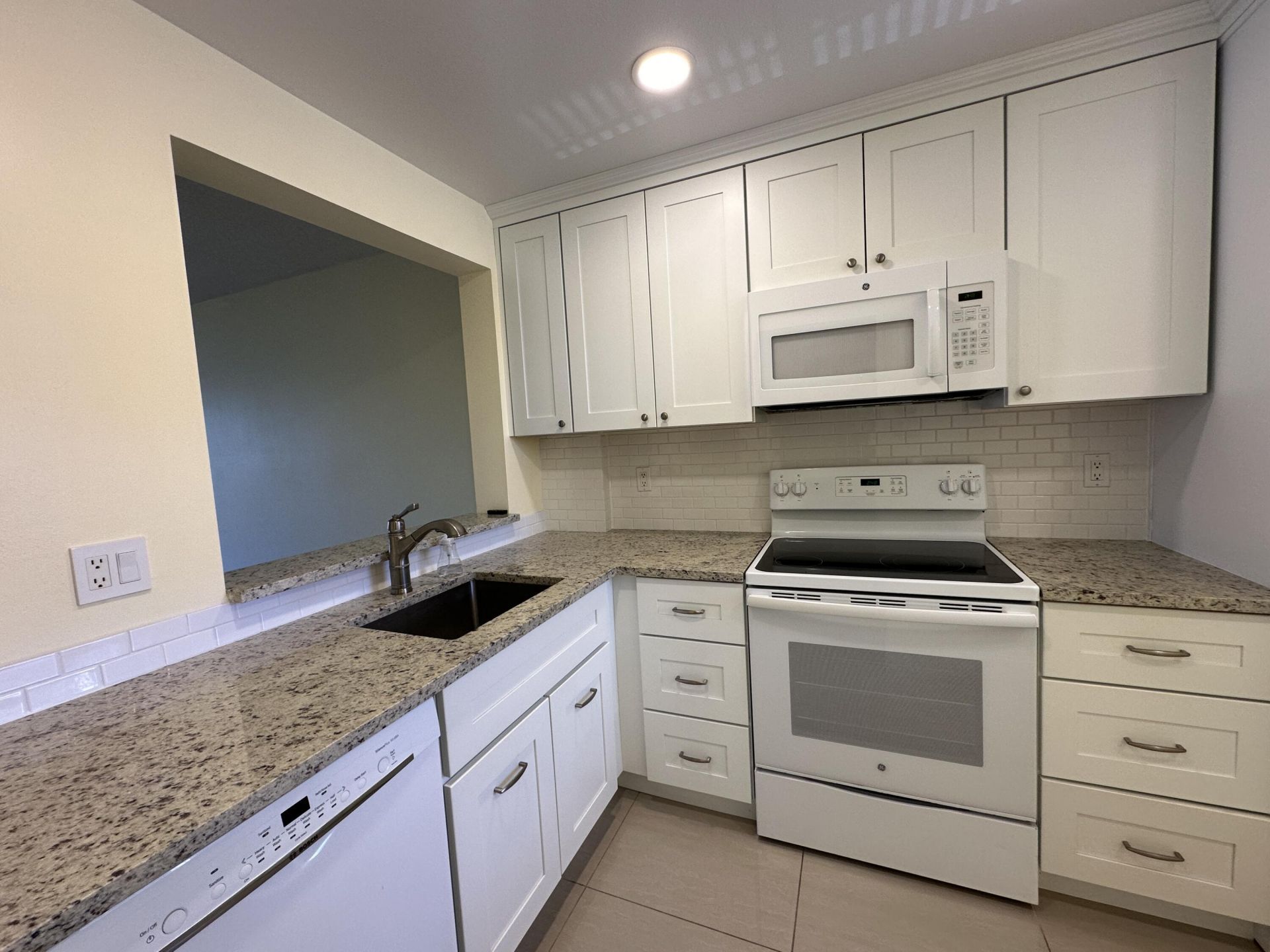 105 Paradise Harbour Boulevard, Unit 209, North Palm Beach, FL 33408 Photo