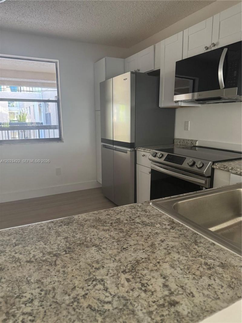 605 Ives Dairy Rd , Unit 306-7, Miami, FL 33179 Photo