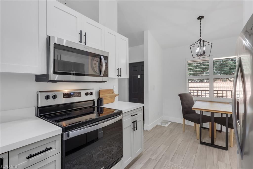 241 Robin Hood Cir, Unit 202, Naples, FL 34104 Photo