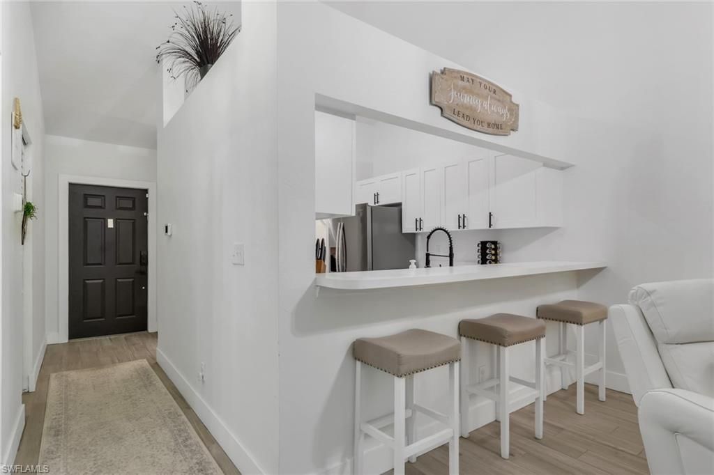 241 Robin Hood Cir, Unit 202, Naples, FL 34104 Photo