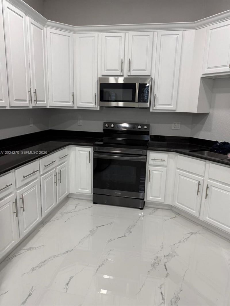 9135 Leatherwood Loop , Lehigh Acres, FL 33936 Photo