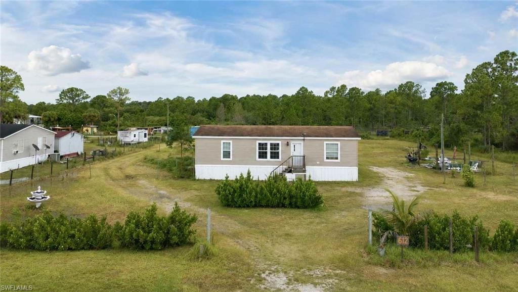 612 Hunting Club Ave , Montura Ranches, FL 33440 Photo