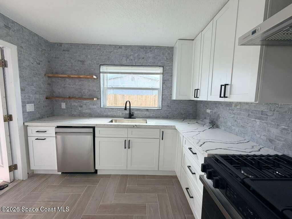 233 NE 1 Street NE , Satellite Beach, FL 32937 Photo