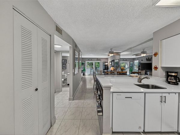 2222 N Cypress Bend Drive, Unit 201, Pompano Beach, FL 33069