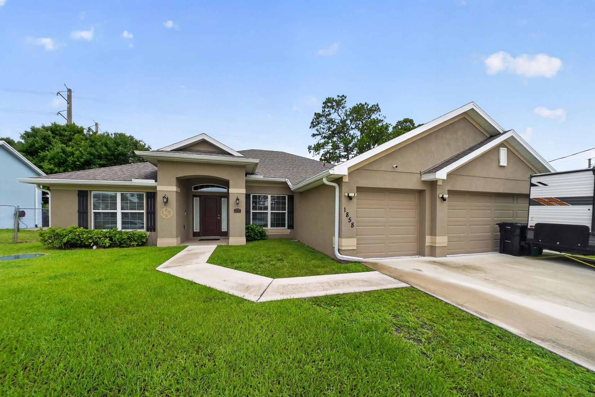 1858 SW Mackenzie Street, Port Saint Lucie, FL 34953 Photo