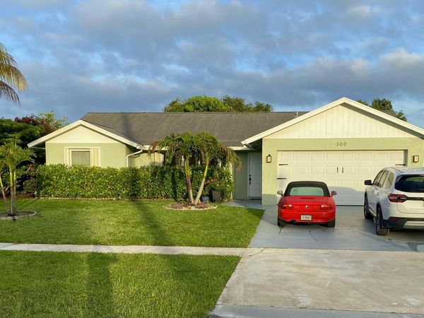 300 La Mancha Avenue, Royal Palm Beach, FL 33411
