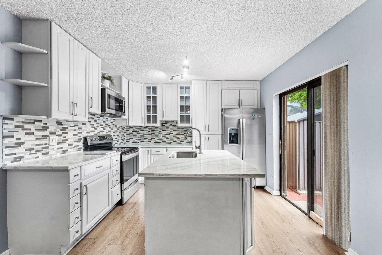 6115 Seven Springs Boulevard, Greenacres, FL 33463 Photo