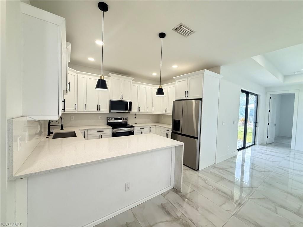 2801 SW 3rd St , Cape Coral, FL 33991 Photo