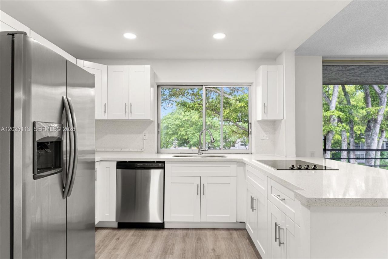 9091 Lime Bay Blvd , Unit 304, Tamarac, FL 33321 Photo