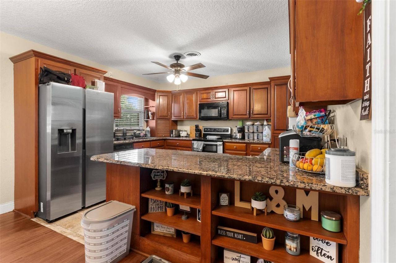 14407 Lake Junietta Drive , Tavares, FL 32778 Photo