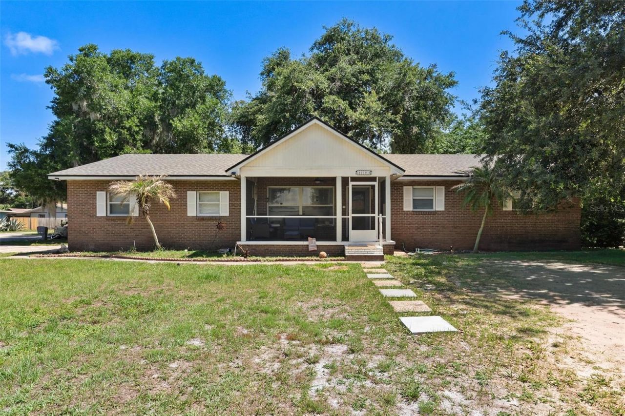 14407 Lake Junietta Drive , Tavares, FL 32778 Photo