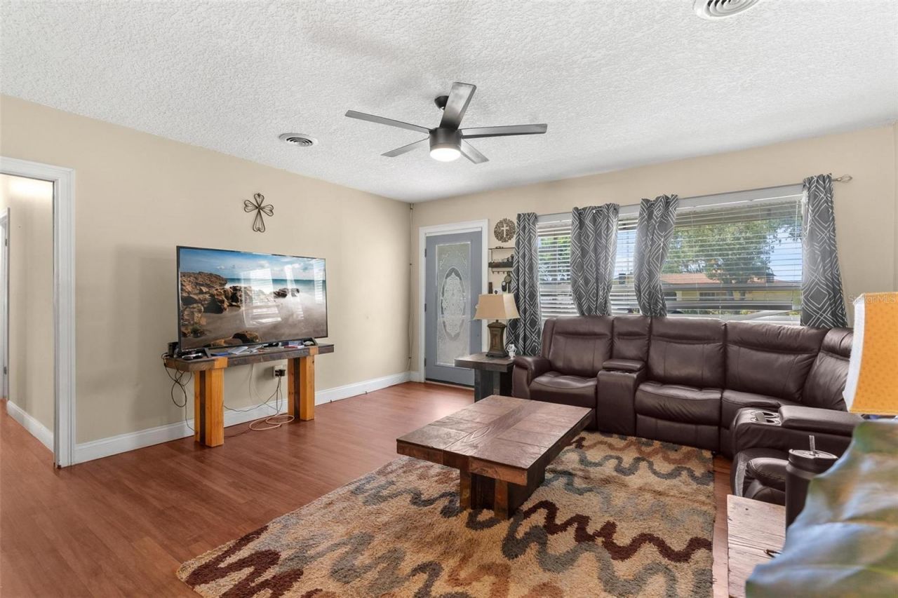 14407 Lake Junietta Drive , Tavares, FL 32778 Photo