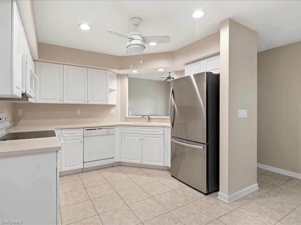 25064 Peacock Ln , Unit 101, Naples, FL 34114 Photo
