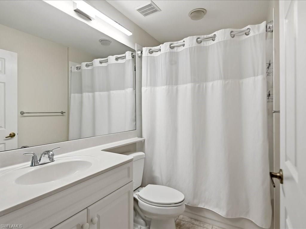 25064 Peacock Ln , Unit 101, Naples, FL 34114 Photo