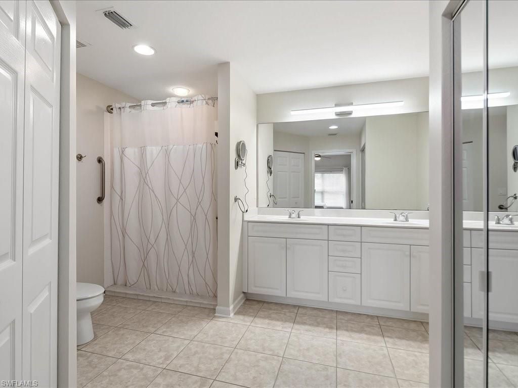 25064 Peacock Ln , Unit 101, Naples, FL 34114 Photo