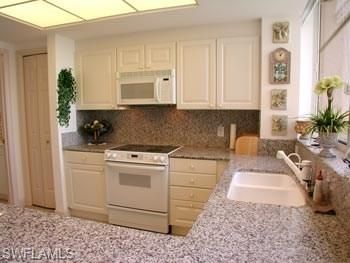 7117 Pelican Bay Blvd, Unit 1202, Naples, FL 34108 Photo