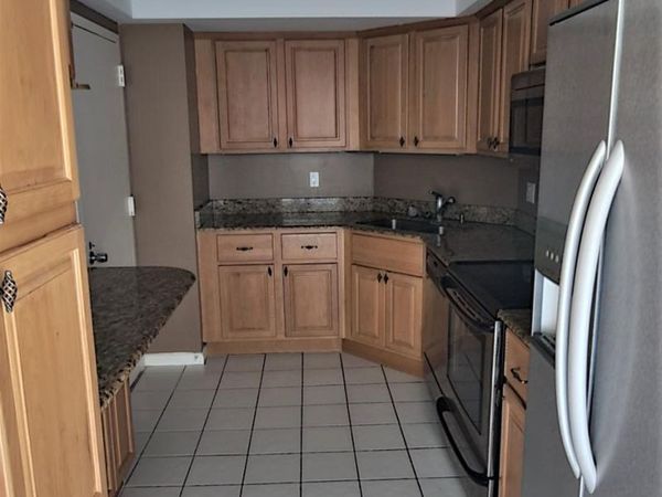 2425 Presidential Way, Unit 402, West Palm Beach, FL 33401