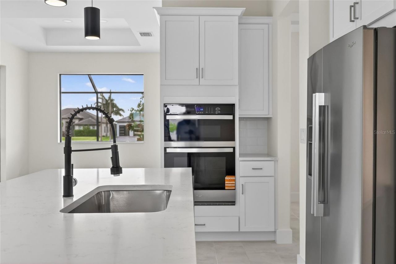 817 NW 38th Place, Cape Coral, FL 33993 Photo