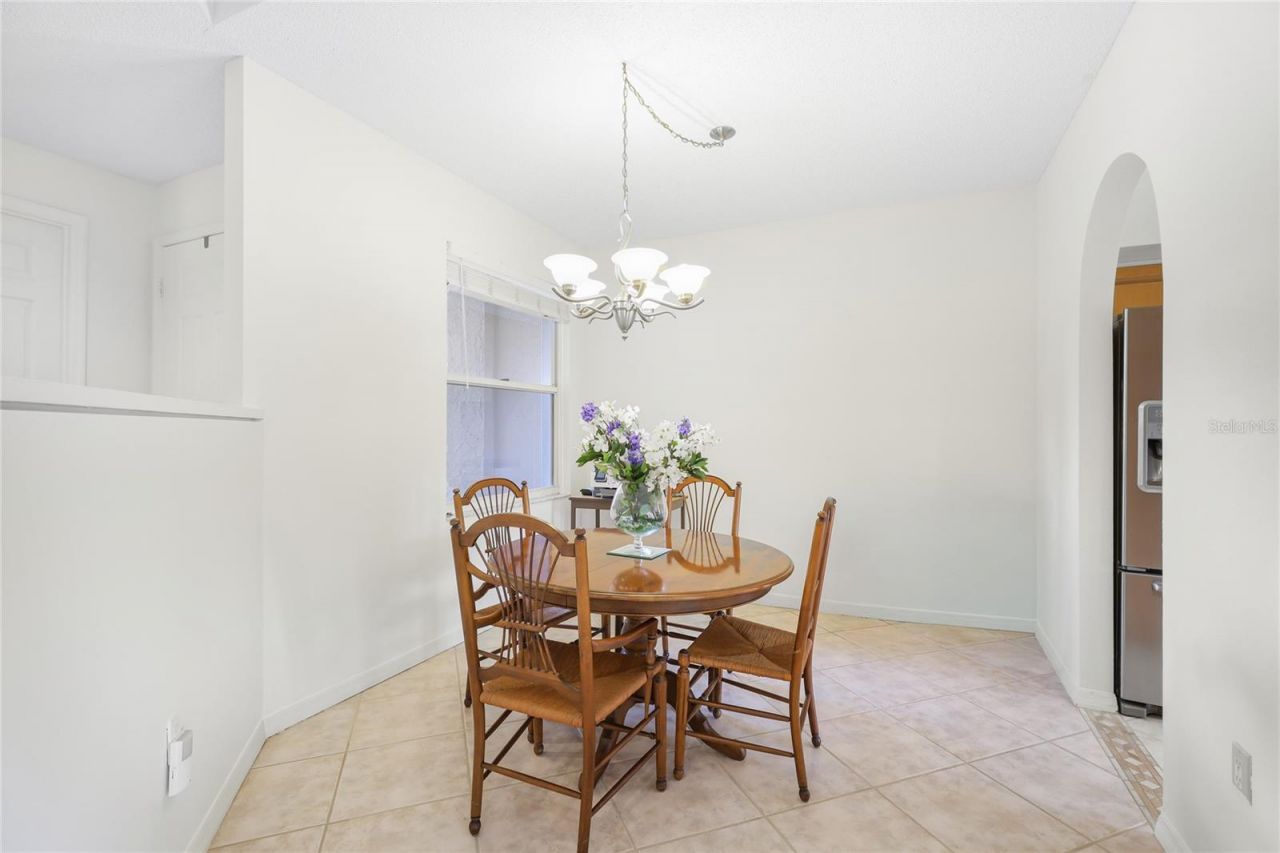 5590 Golf Pointe Drive, Unit 5590, Sarasota, FL 34243 Photo