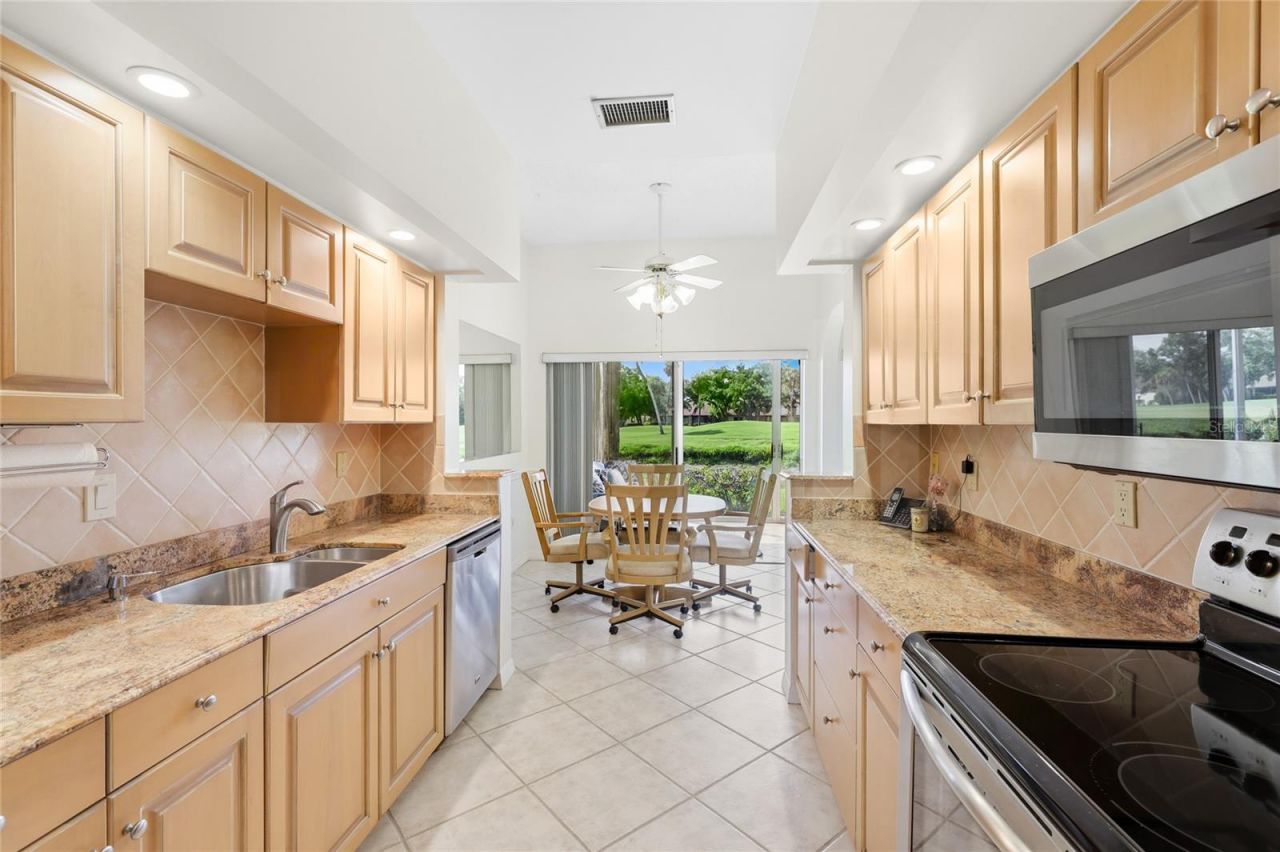 5590 Golf Pointe Drive, Unit 5590, Sarasota, FL 34243 Photo