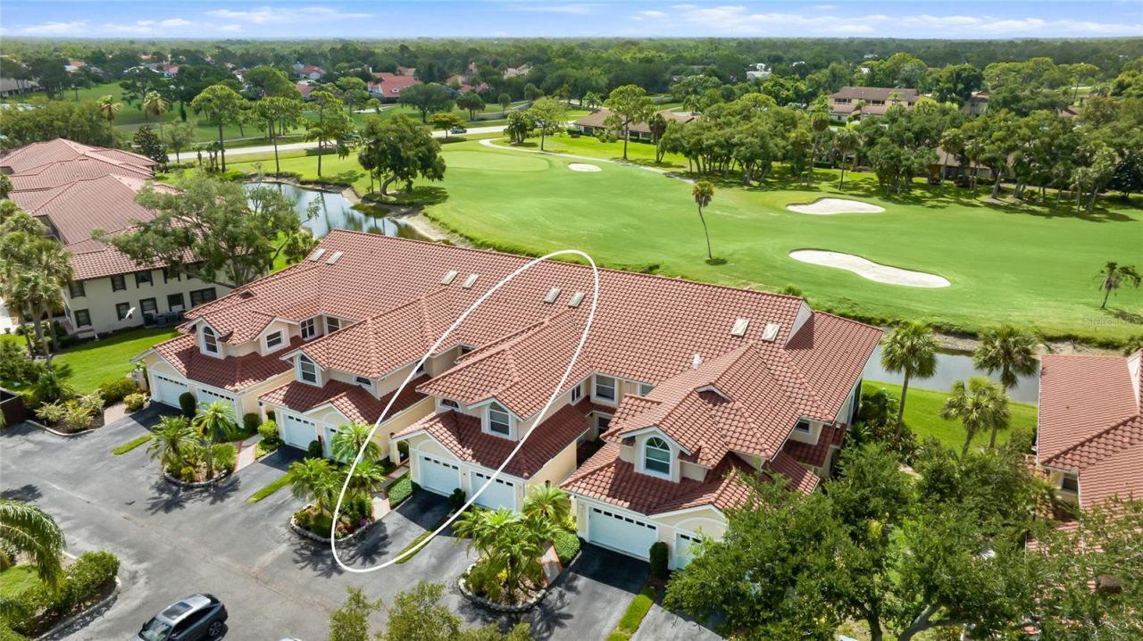 5590 Golf Pointe Drive, Unit 5590, Sarasota, FL 34243 Photo