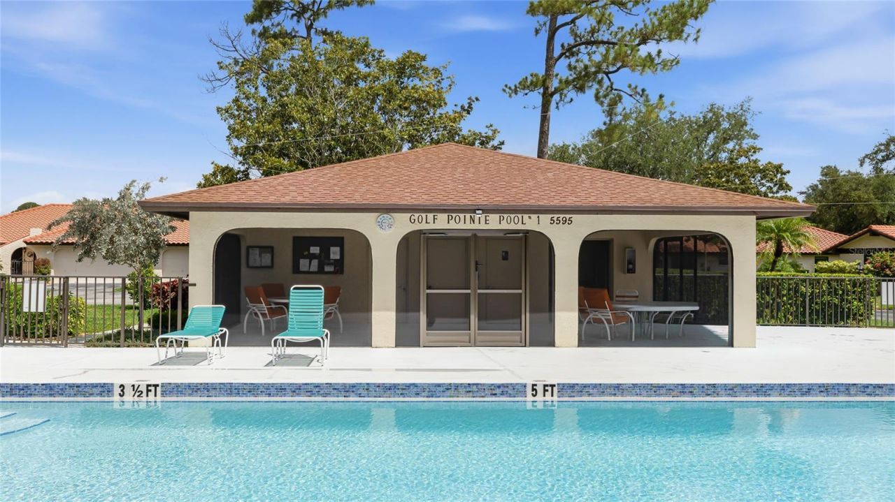 5590 Golf Pointe Drive, Unit 5590, Sarasota, FL 34243 Photo