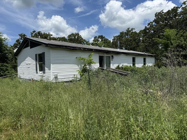 325 S Ozark Trail , Goodman, MO 64843