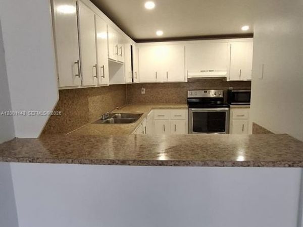 6950 Miami Gardens Dr , Unit 2-201, Hialeah, FL 33015