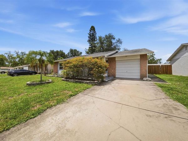 7976 SHADOW RUN DRIVE , LARGO, FL 33773