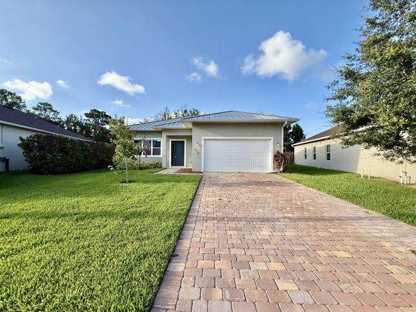 675 NE Moss Rose Place, Port St. Lucie, FL 34983