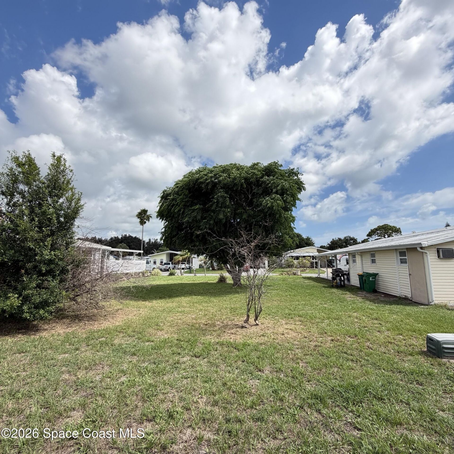 334 Macadamia Drive , Barefoot Bay, FL 32976 Photo