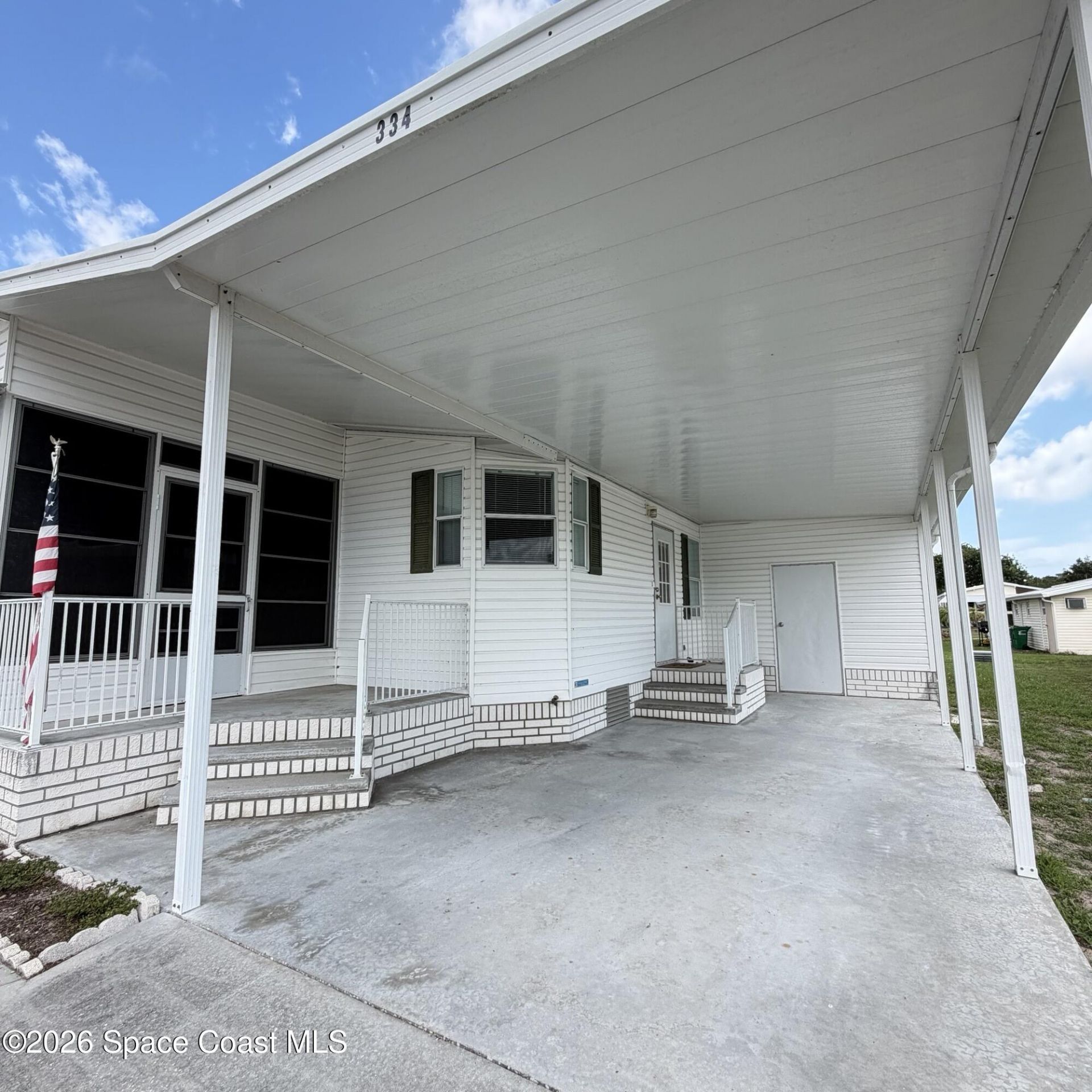 334 Macadamia Drive , Barefoot Bay, FL 32976 Photo