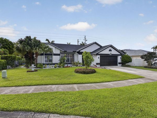 102 E Royal Pine Cir Court, Royal Palm Beach, FL 33411