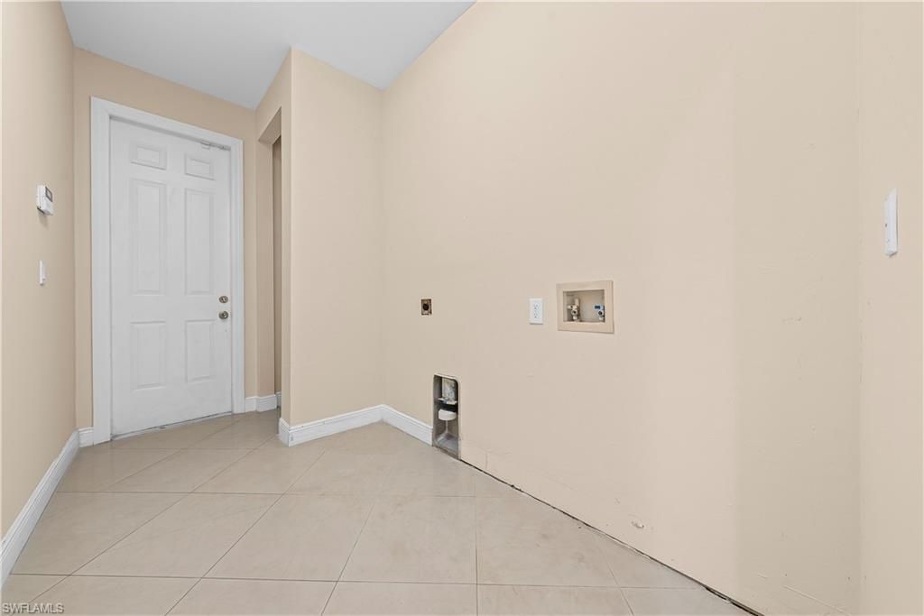 680 Mirror Lakes Ct , Lehigh Acres, FL 33974 Photo