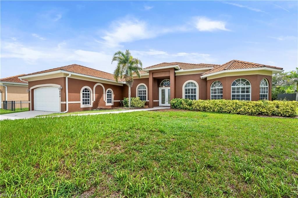 680 Mirror Lakes Ct , Lehigh Acres, FL 33974 Photo