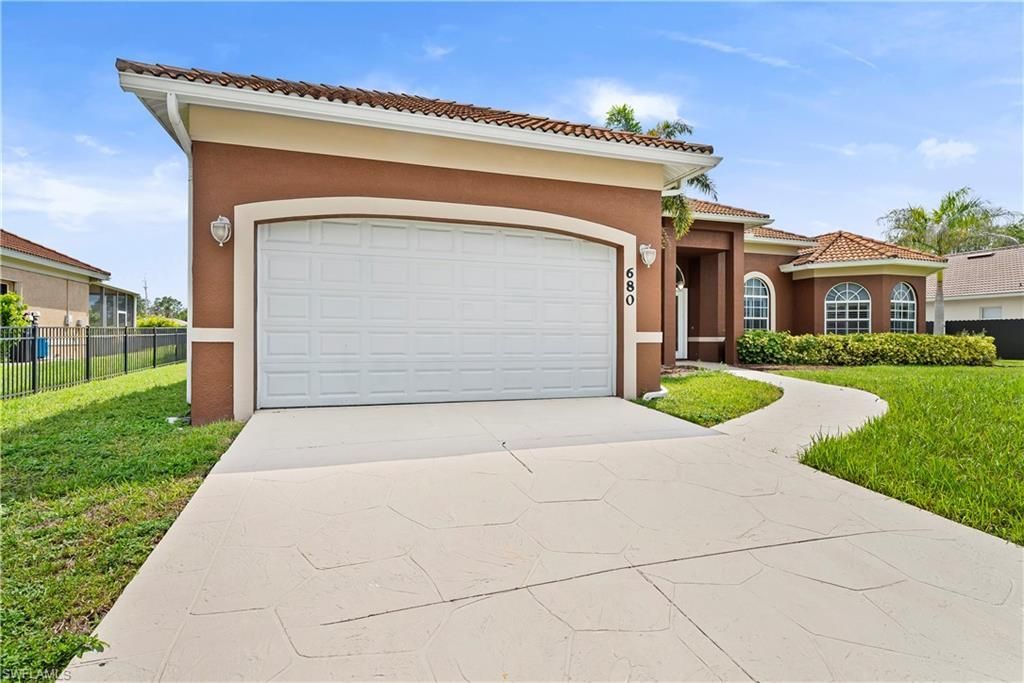 680 Mirror Lakes Ct , Lehigh Acres, FL 33974 Photo