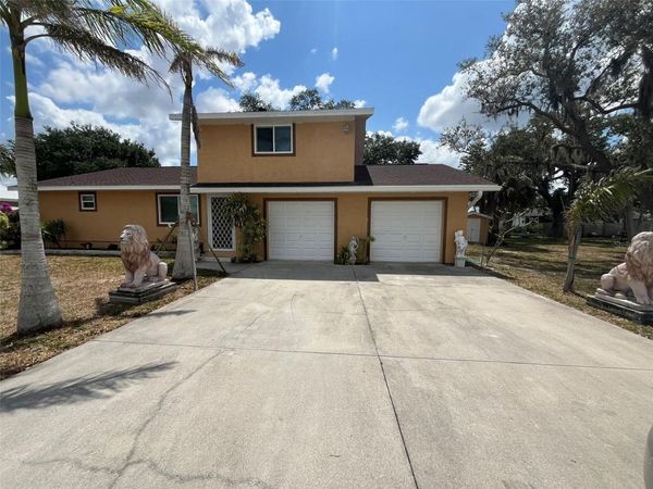 671 SPRING LAKE BOULEVARD NW, PORT CHARLOTTE, FL 33952