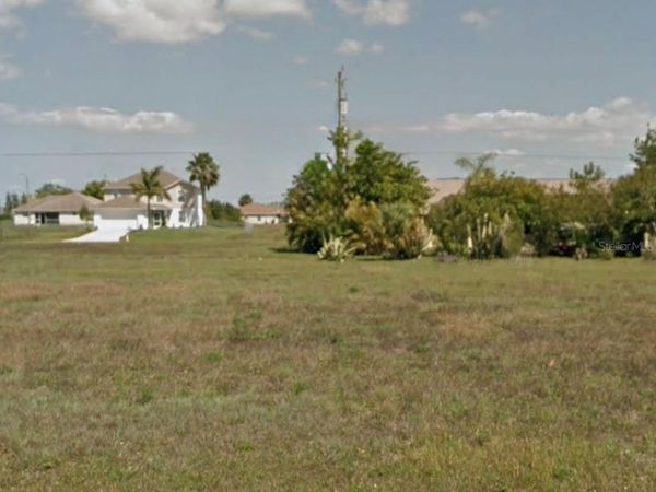 1313 NELSON ROAD N, CAPE CORAL, FL 33993