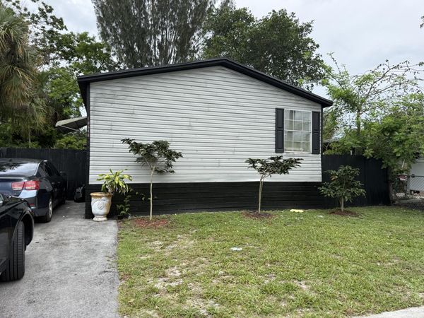 10548 W Sandalfoot Blvd W, Watergate, FL 33428