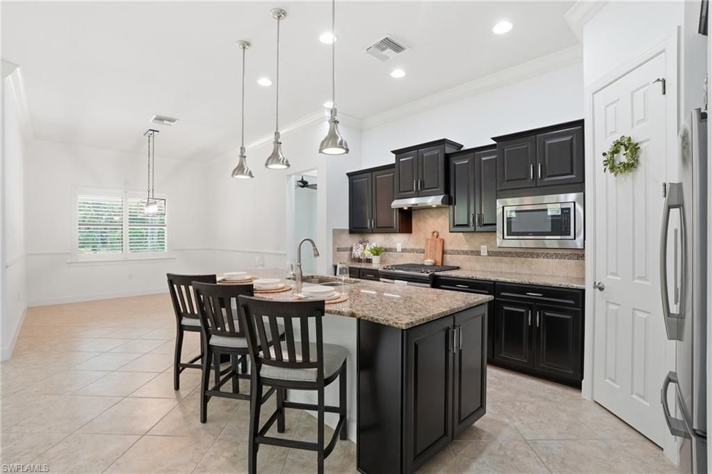 9436 Whooping Crane Way , Naples, FL 34120 Photo