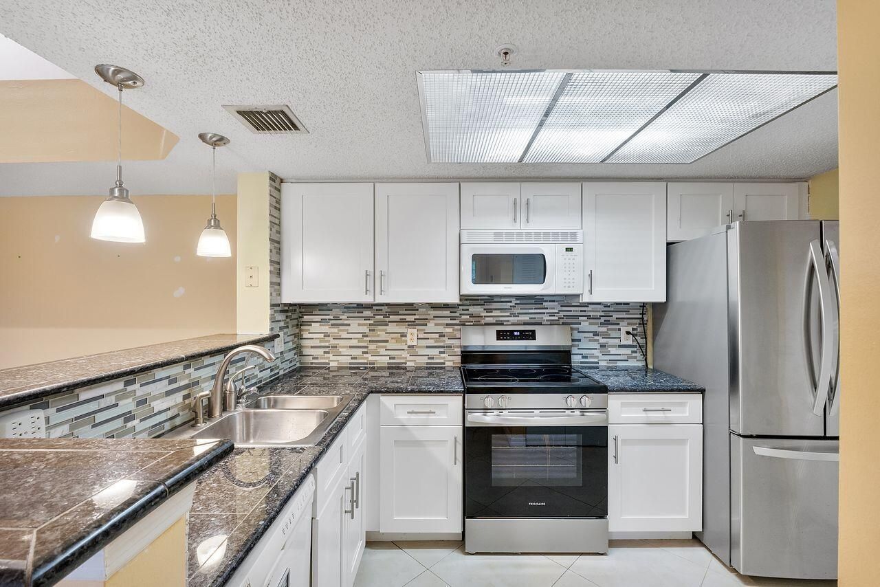 5011 Wiles Road, Unit 303, Coconut Creek, FL 33073 Photo