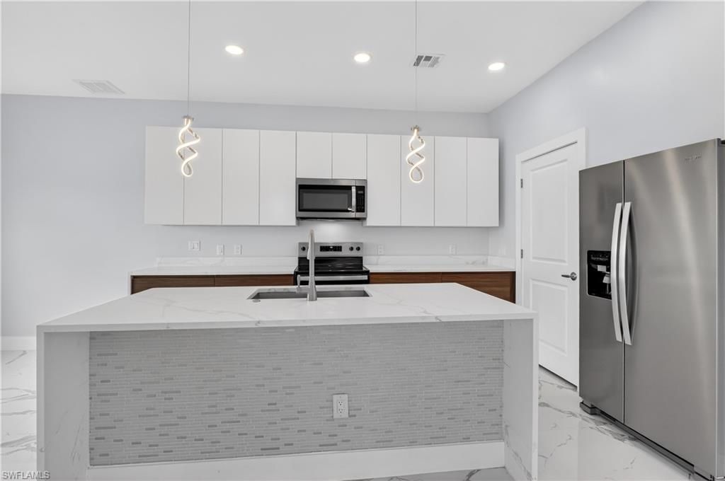 454 Mercedes Ct, Lehigh Acres, FL 33972 Photo