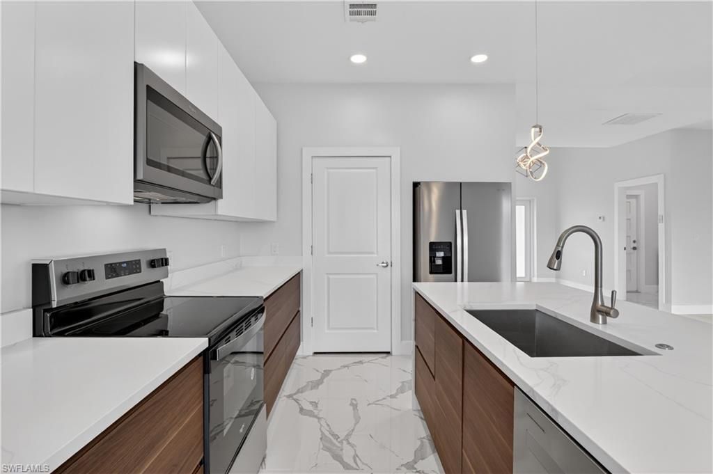 454 Mercedes Ct, Lehigh Acres, FL 33972 Photo
