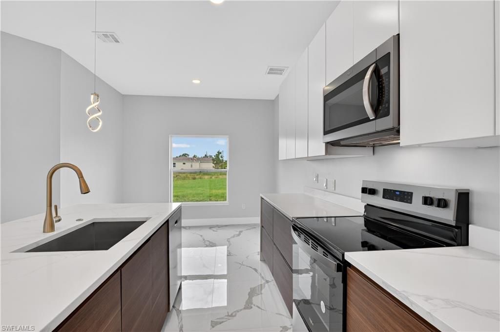 454 Mercedes Ct, Lehigh Acres, FL 33972 Photo