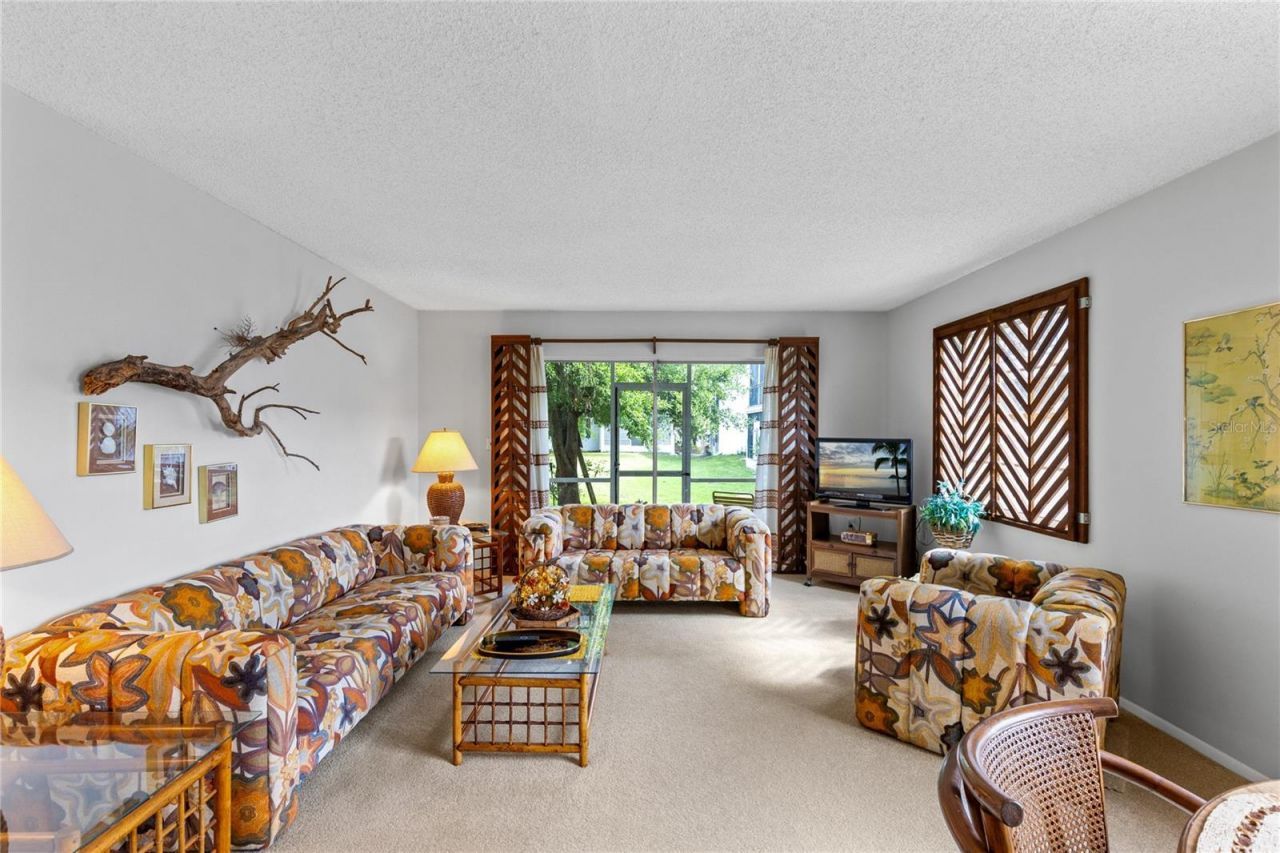 6075 Amberly Court , Unit F40, Orlando, FL 32822 Photo