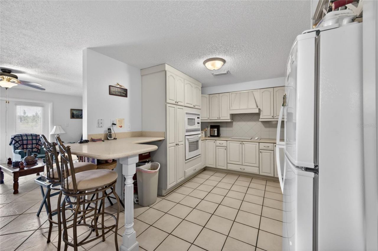 8433 Limonia Drive , Indian Lake Estates, FL 33855 Photo